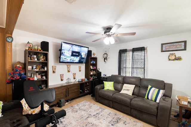 1115 Fuller Dr, Longview, TX 75602 - living area featuring a ceiling fan and light tile patterned floors