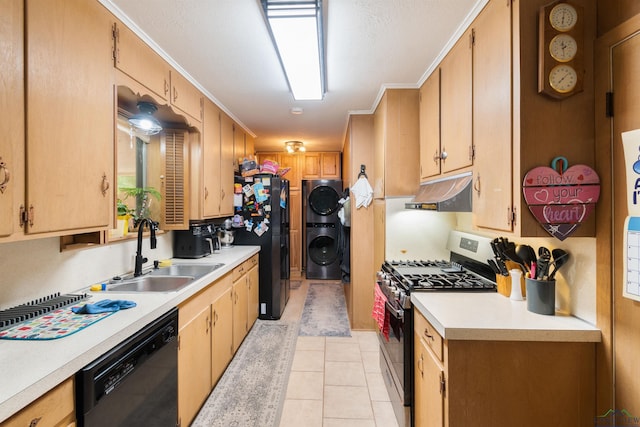 1115 Fuller Dr, Longview, TX 75602 - kitchen with black appliances, under cabinet range hood, light countertops, stacked washer / dryer, and light tile patterned floors
