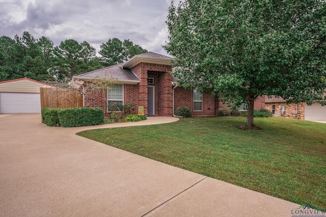 view of front of house with a front lawn and a garage