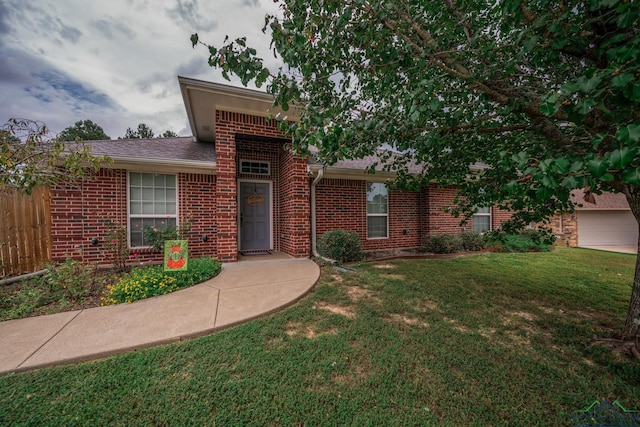 view of front facade with a front lawn