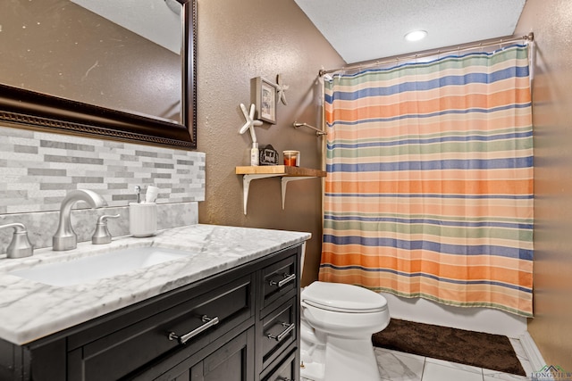 full bath with tasteful backsplash, vanity, toilet, marble finish floor, and shower / tub combo