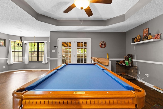 rec room featuring a textured ceiling, french doors, a ceiling fan, baseboards, and wood finished floors