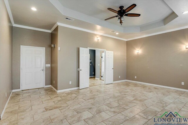 5796 Hwy 271 S, Pittsburg, TX 75686 - spare room with a ceiling fan, crown molding, a tray ceiling, recessed lighting, and baseboards