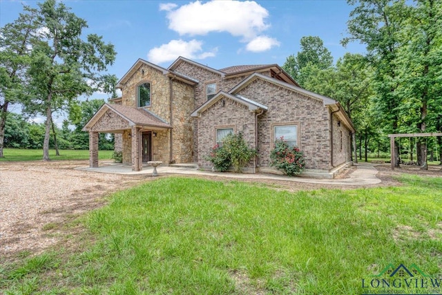 5796 Hwy 271 S, Pittsburg, TX 75686 - view of front of property featuring a front lawn, brick siding, and stone siding