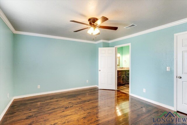 5796 Hwy 271 S, Pittsburg, TX 75686 - unfurnished bedroom featuring wood finished floors, baseboards, ornamental molding, and ceiling fan