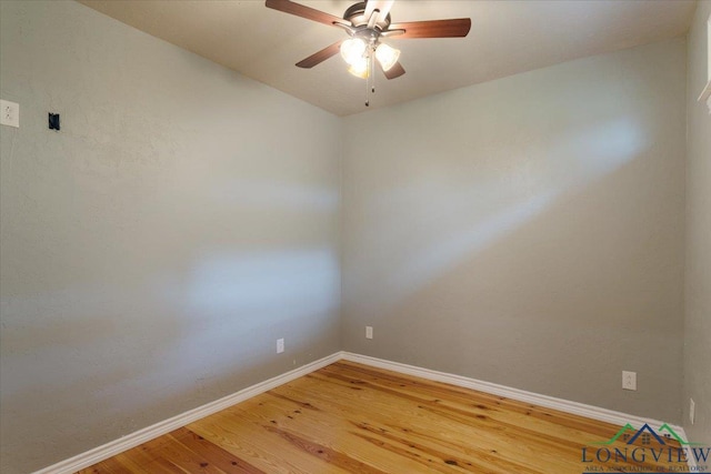 5796 Hwy 271 S, Pittsburg, TX 75686 - spare room featuring wood finished floors, ceiling fan, and baseboards