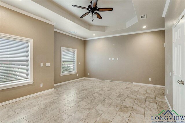 5796 Hwy 271 S, Pittsburg, TX 75686 - empty room with ceiling fan, a raised ceiling, ornamental molding, recessed lighting, and baseboards
