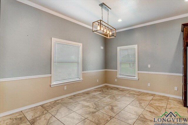 5796 Hwy 271 S, Pittsburg, TX 75686 - empty room with ornamental molding, plenty of natural light, a chandelier, and baseboards