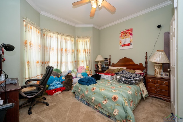 carpeted bedroom with ceiling fan and crown molding