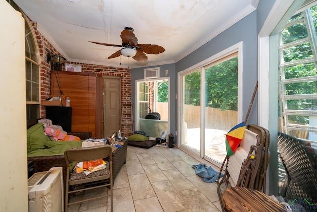 sunroom / solarium with ceiling fan