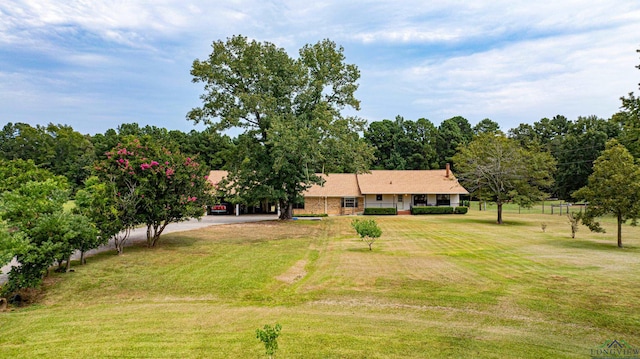 exterior space featuring a front yard