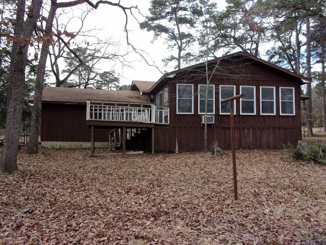 rear view of house with a deck
