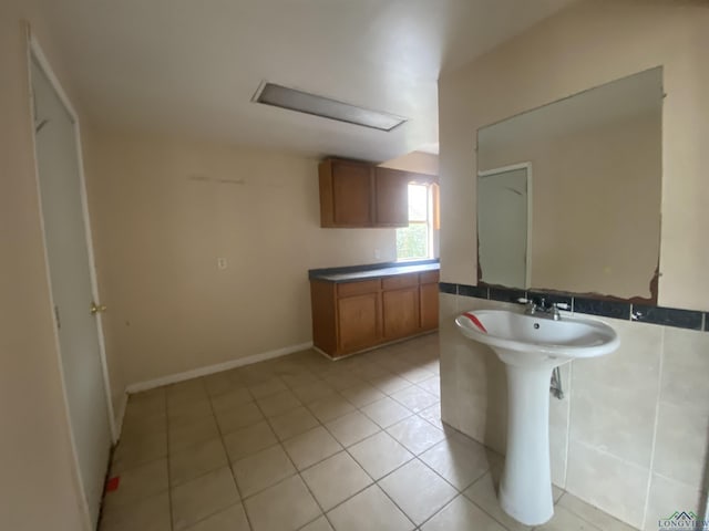 bathroom with sink and tile patterned floors