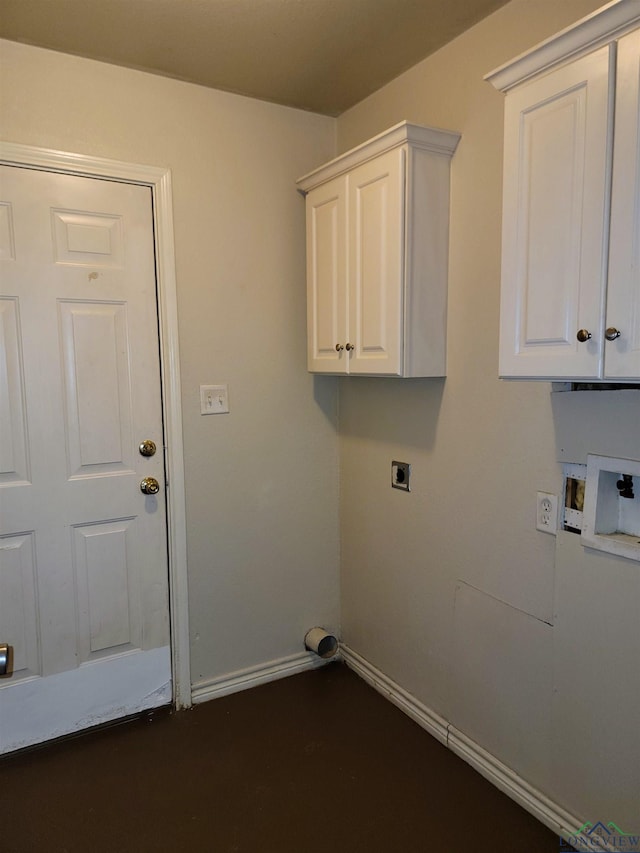 laundry area with hookup for an electric dryer and cabinets