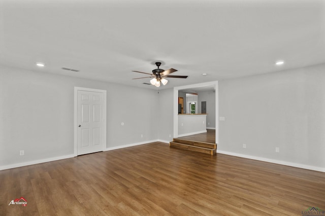 unfurnished living room with hardwood / wood-style floors and ceiling fan