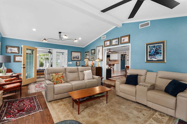 589 County Road 183, Carthage, TX 75633 - living area featuring ceiling fan, french doors, wood finished floors, crown molding, and a chandelier