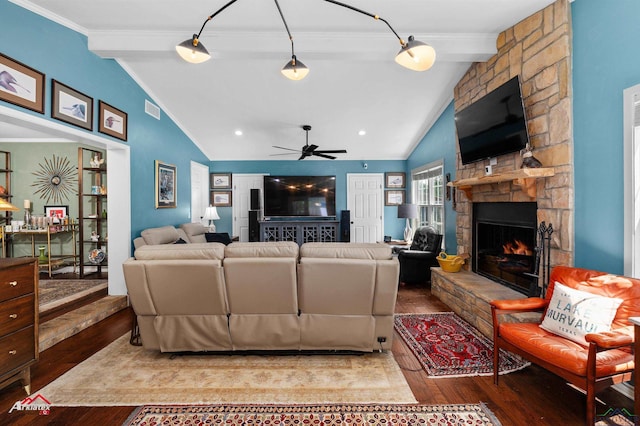 589 County Road 183, Carthage, TX 75633 - living area with wood-type flooring, a stone fireplace, crown molding, and ceiling fan