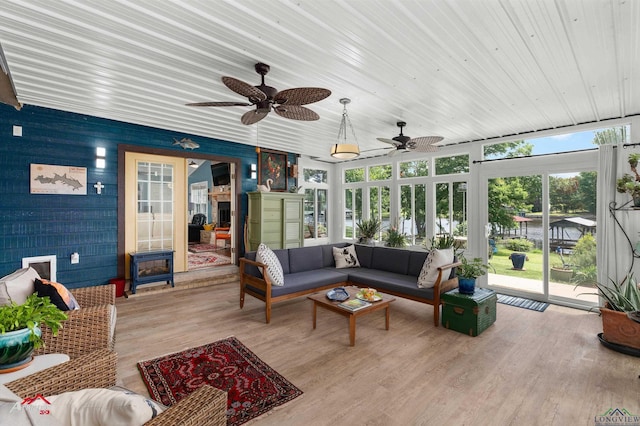 589 County Road 183, Carthage, TX 75633 - sunroom featuring a wood stove