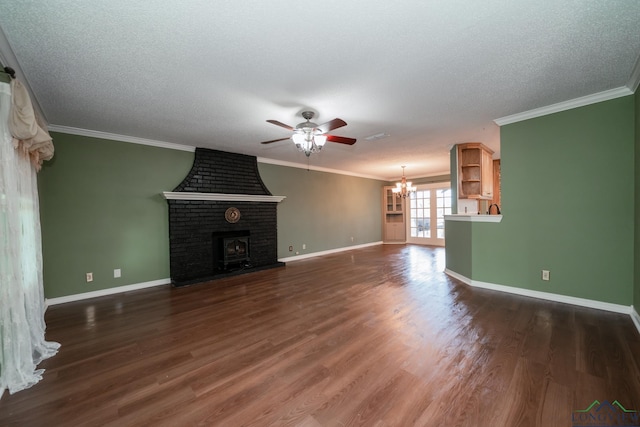 unfurnished living room with dark hardwood / wood-style flooring, a fireplace, and ornamental molding