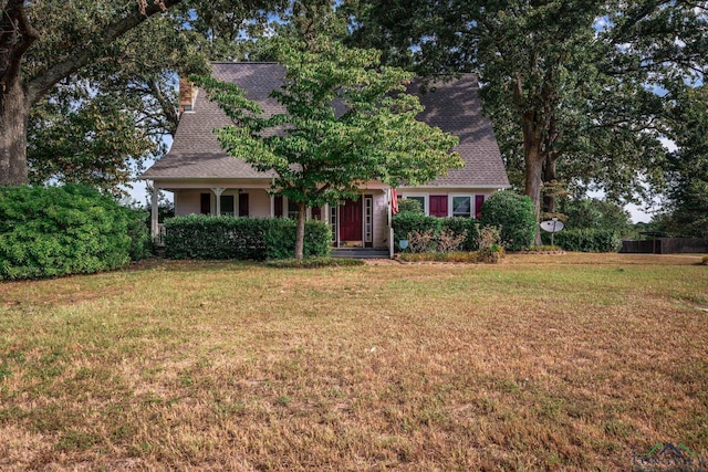 view of front of home with a front yard