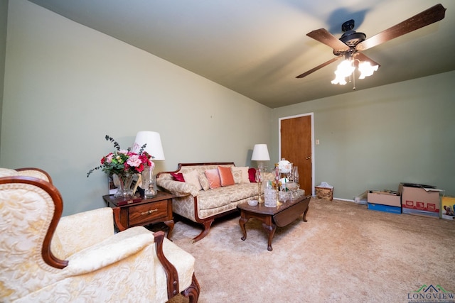 living room with ceiling fan and carpet floors