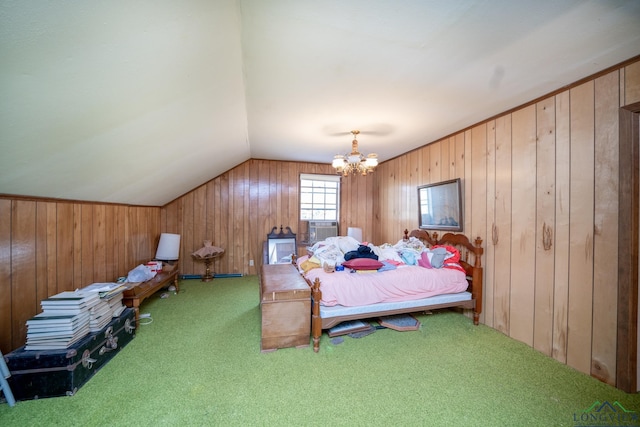 bedroom featuring carpet flooring, vaulted ceiling, and an inviting chandelier