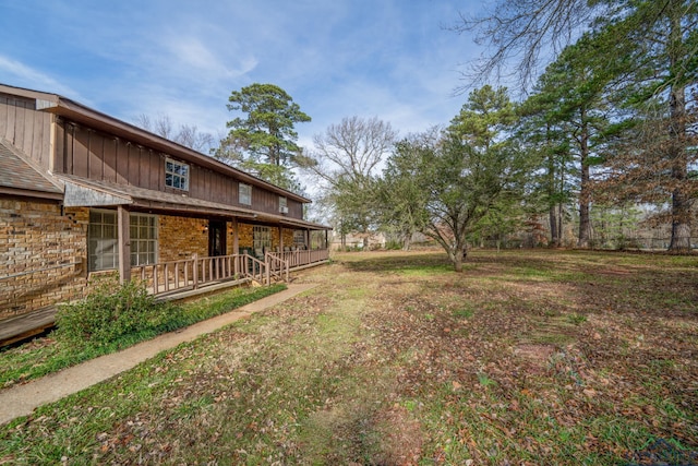 view of yard with a porch