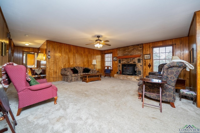 living room with ceiling fan and light colored carpet