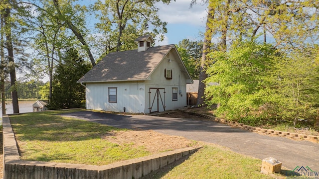 316 County Road 2750, Hughes Springs, TX 75656 - view of outdoor structure with an outbuilding