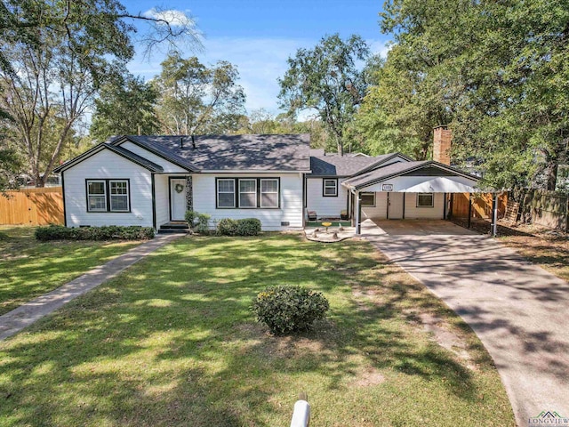 ranch-style home featuring a carport and a front lawn