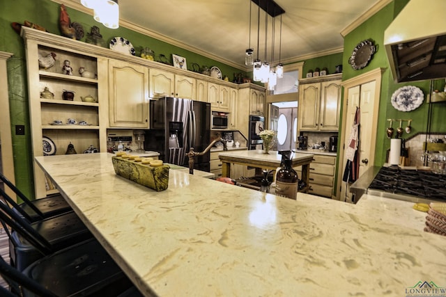 kitchen featuring pendant lighting, appliances with stainless steel finishes, a kitchen bar, kitchen peninsula, and extractor fan