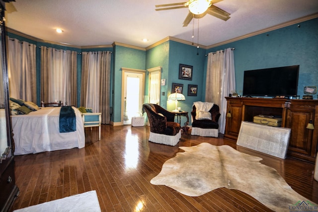 bedroom with ceiling fan, crown molding, and dark wood-type flooring