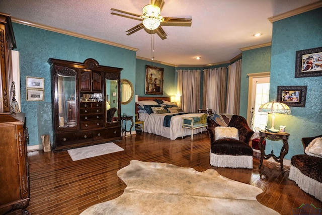 bedroom featuring dark wood-type flooring, ceiling fan, and ornamental molding