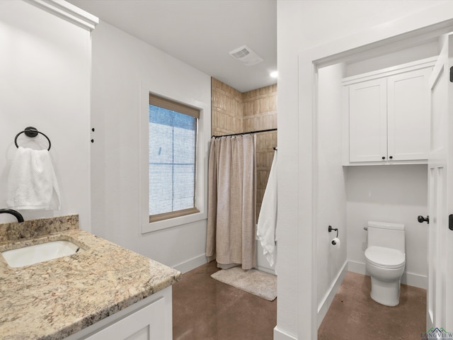 3472 Fm 2869, Hawkins, TX 75765 - bathroom featuring concrete flooring, baseboards, toilet, curtained shower, and vanity