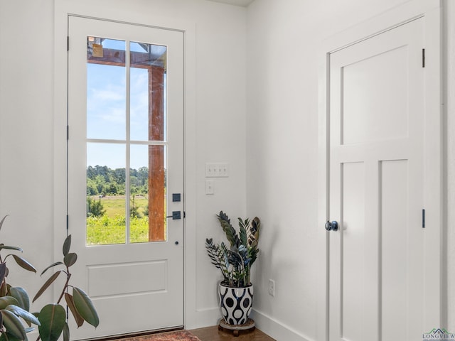 3472 Fm 2869, Hawkins, TX 75765 - doorway featuring healthy amount of natural light and baseboards