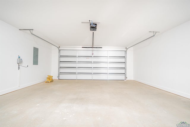 garage with electric panel and a garage door opener