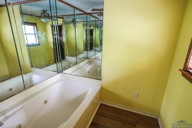 bathroom featuring a bathing tub and wood-type flooring