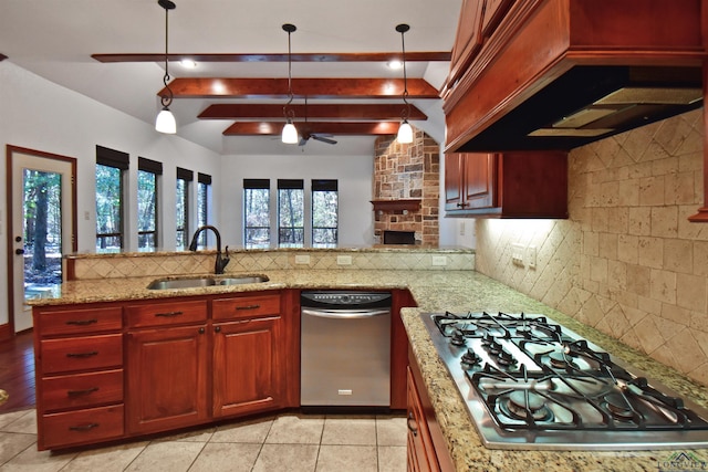 kitchen featuring sink, hanging light fixtures, beamed ceiling, decorative backsplash, and custom exhaust hood