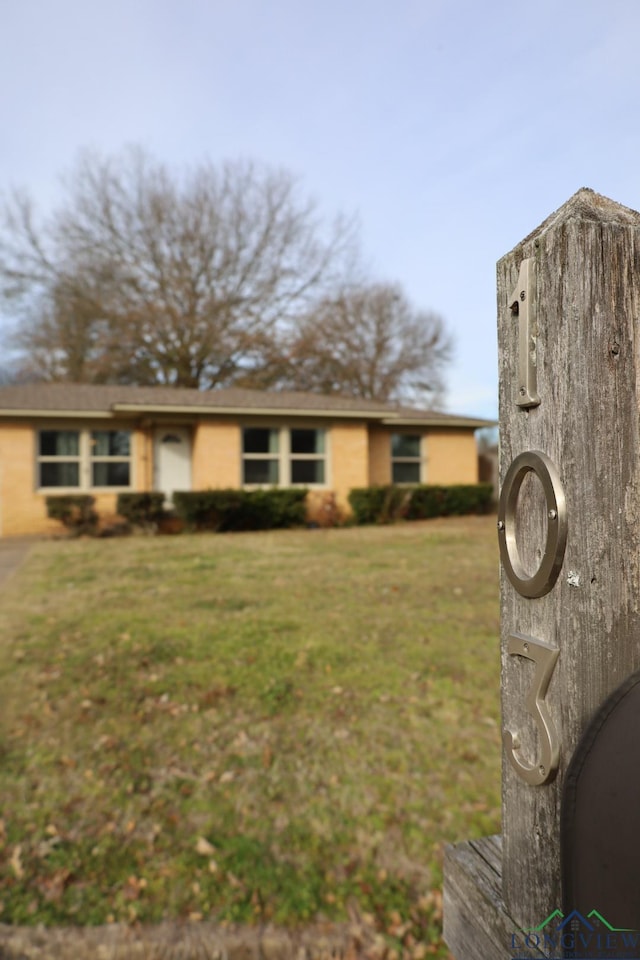 view of front of home with a front yard