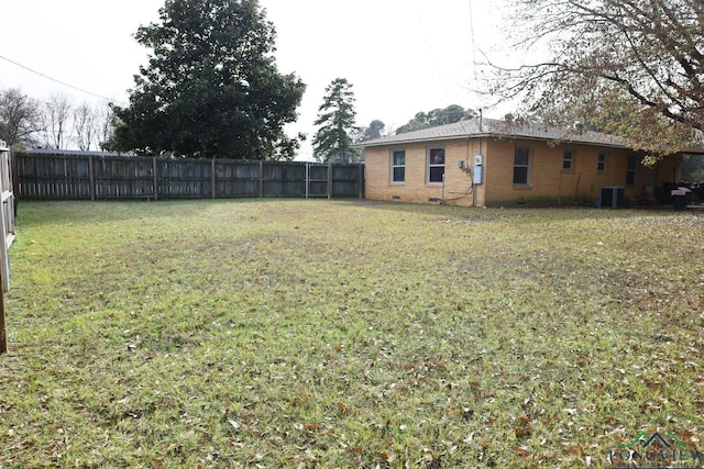 view of yard with central air condition unit