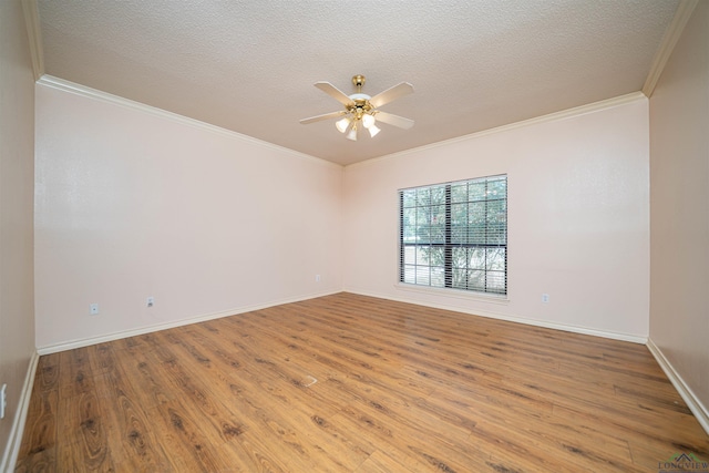 9211 Elm Tree Cir, Tyler, TX 75703 - unfurnished room with crown molding, a ceiling fan, wood finished floors, baseboards, and a textured ceiling