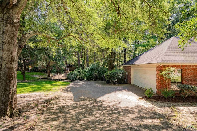 9211 Elm Tree Cir, Tyler, TX 75703 - garage featuring driveway