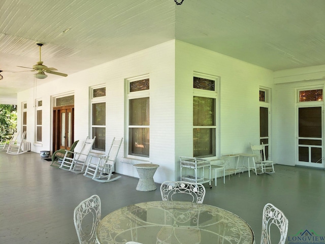 view of patio / terrace featuring ceiling fan and covered porch