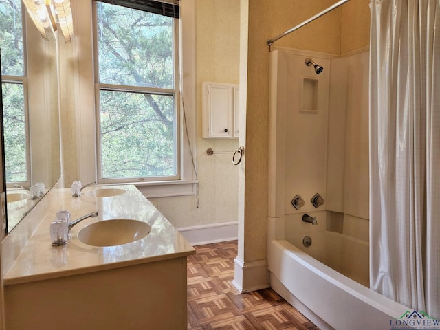 bathroom featuring vanity, parquet floors, a wealth of natural light, and shower / tub combo with curtain