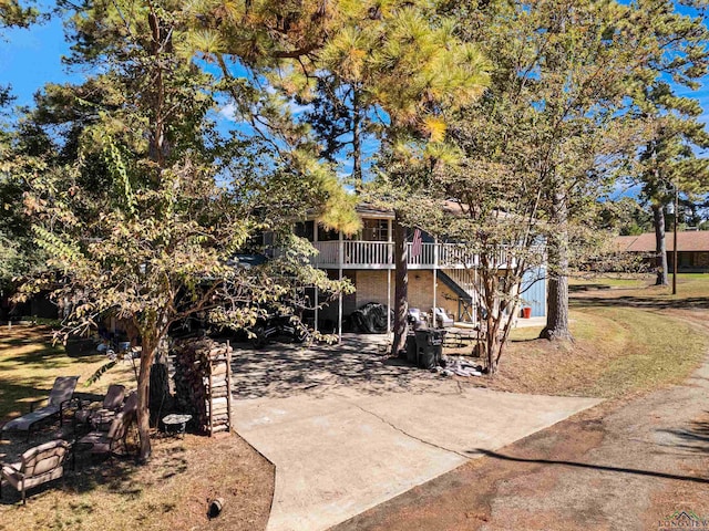 view of front of property featuring a deck