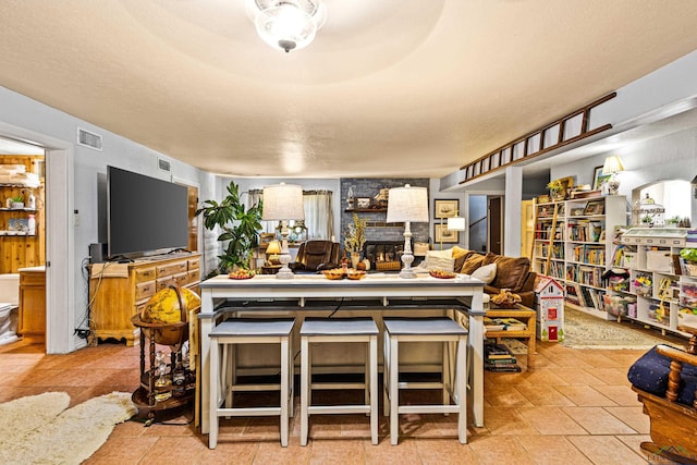 interior space featuring a large fireplace