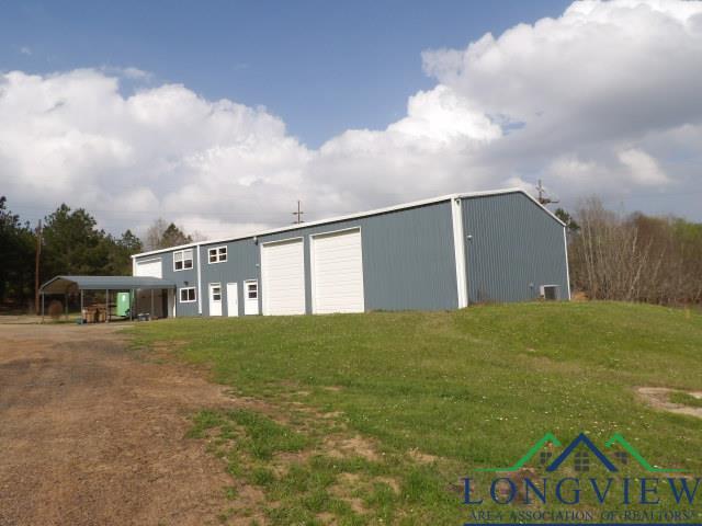 view of outdoor structure featuring a yard