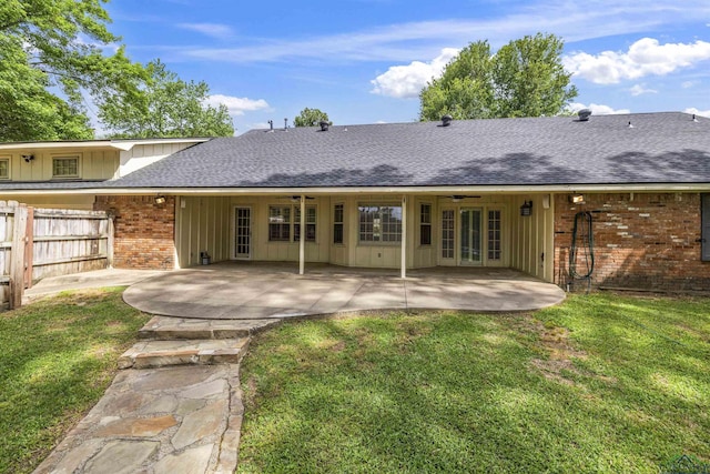 3 Ramblewood Dr, Longview, TX 75605 - rear view of house featuring brick siding, roof with shingles, french doors, and a patio