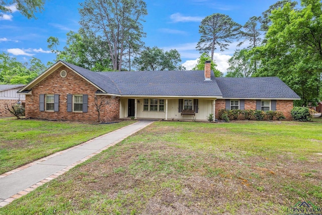3 Ramblewood Dr, Longview, TX 75605 - single story home with a chimney, brick siding, a front lawn, and a porch