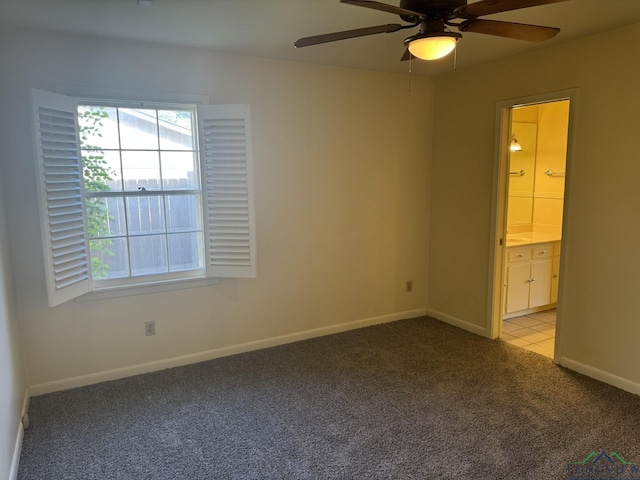 3 Ramblewood Dr, Longview, TX 75605 - spare room with light colored carpet, a ceiling fan, healthy amount of natural light, and baseboards